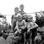 Lionel on July 26, 1944 surrounded by his brother Gilles's kids: Back row: Ronald and Gilbert and in his arms, Robert and Francine.