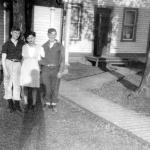 Lionel, Yo and  brother, Jean Guy in front of the family home in 1945.